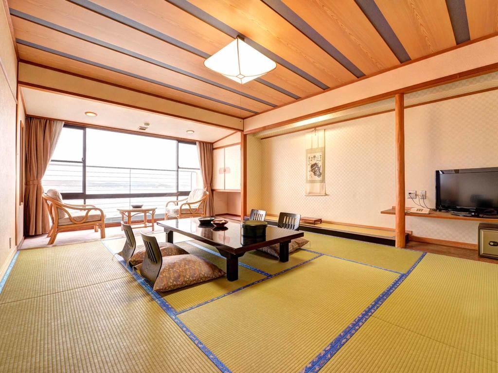 Taikairo Hotell Minamichita Rum bild
