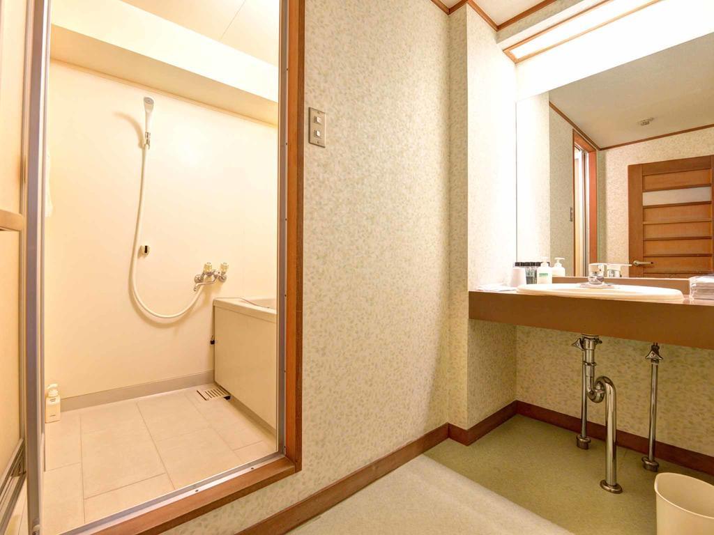 Taikairo Hotell Minamichita Rum bild